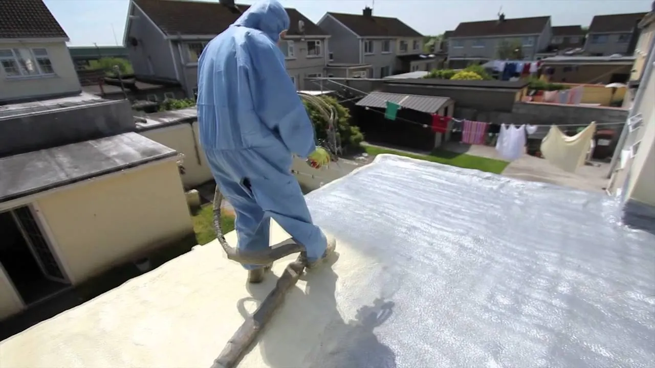 Spray-applied coating on a residential flat roof